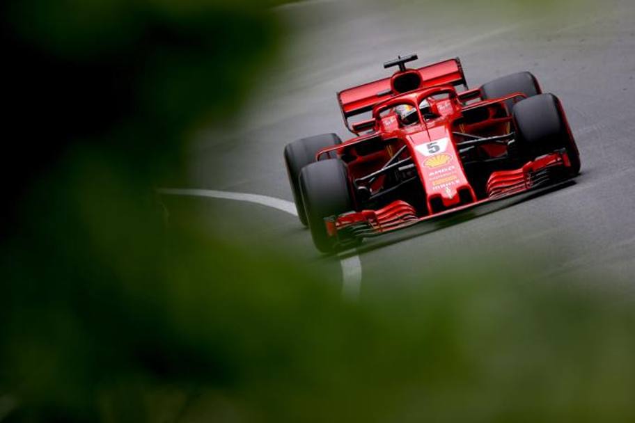 La Ferrari di Vettel durante il GP. Afp
